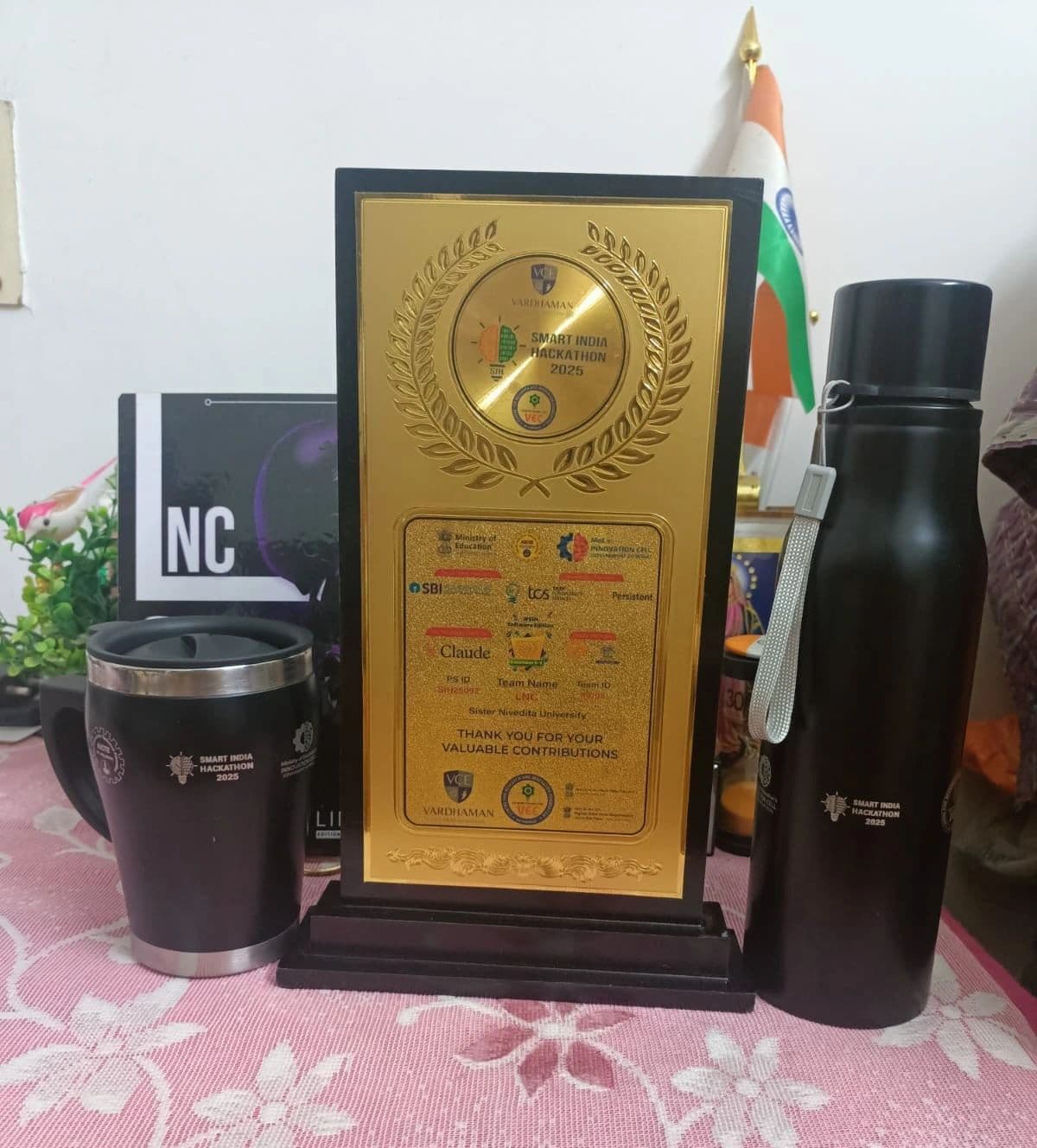 Innovation award displayed with LNC merchandise