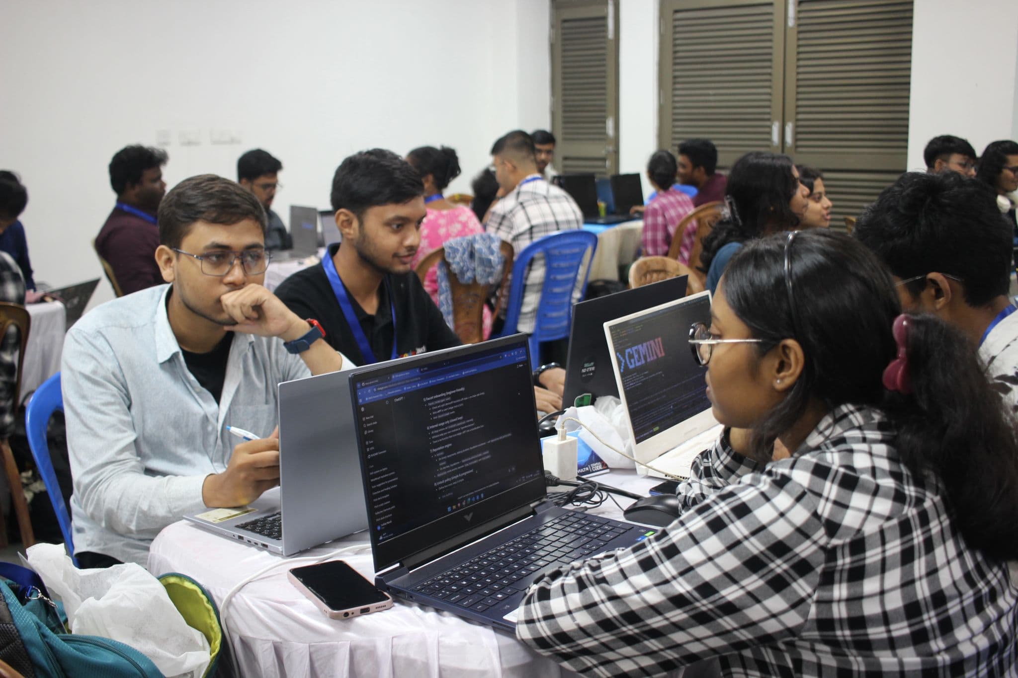 Developers working together during a coding session