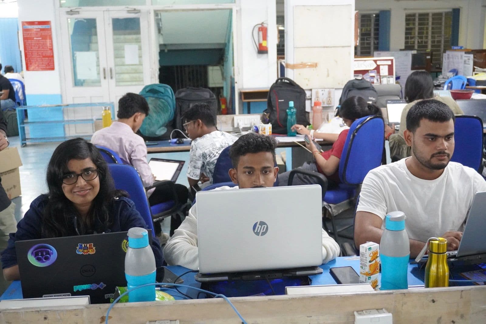 Students collaborating during a campus coding session