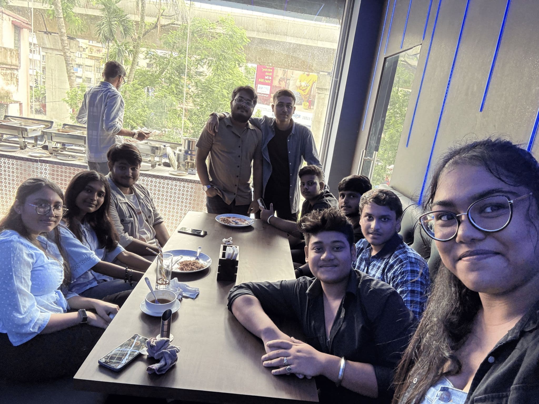 LNC members taking a group selfie over dinner