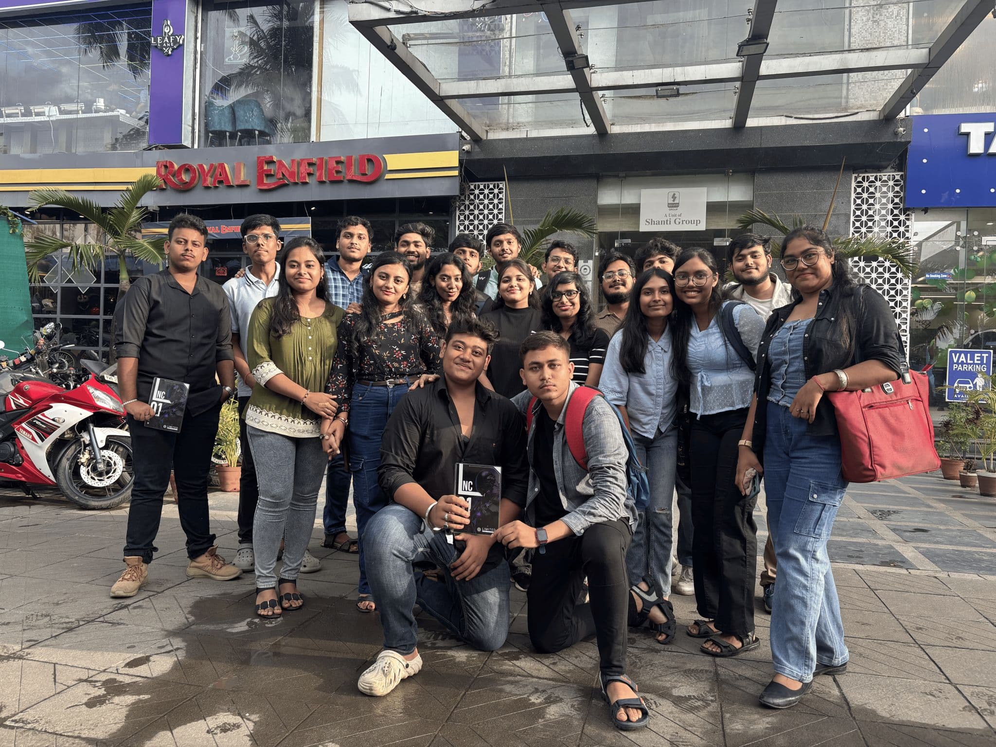 LNC community gathered outside a Royal Enfield showroom