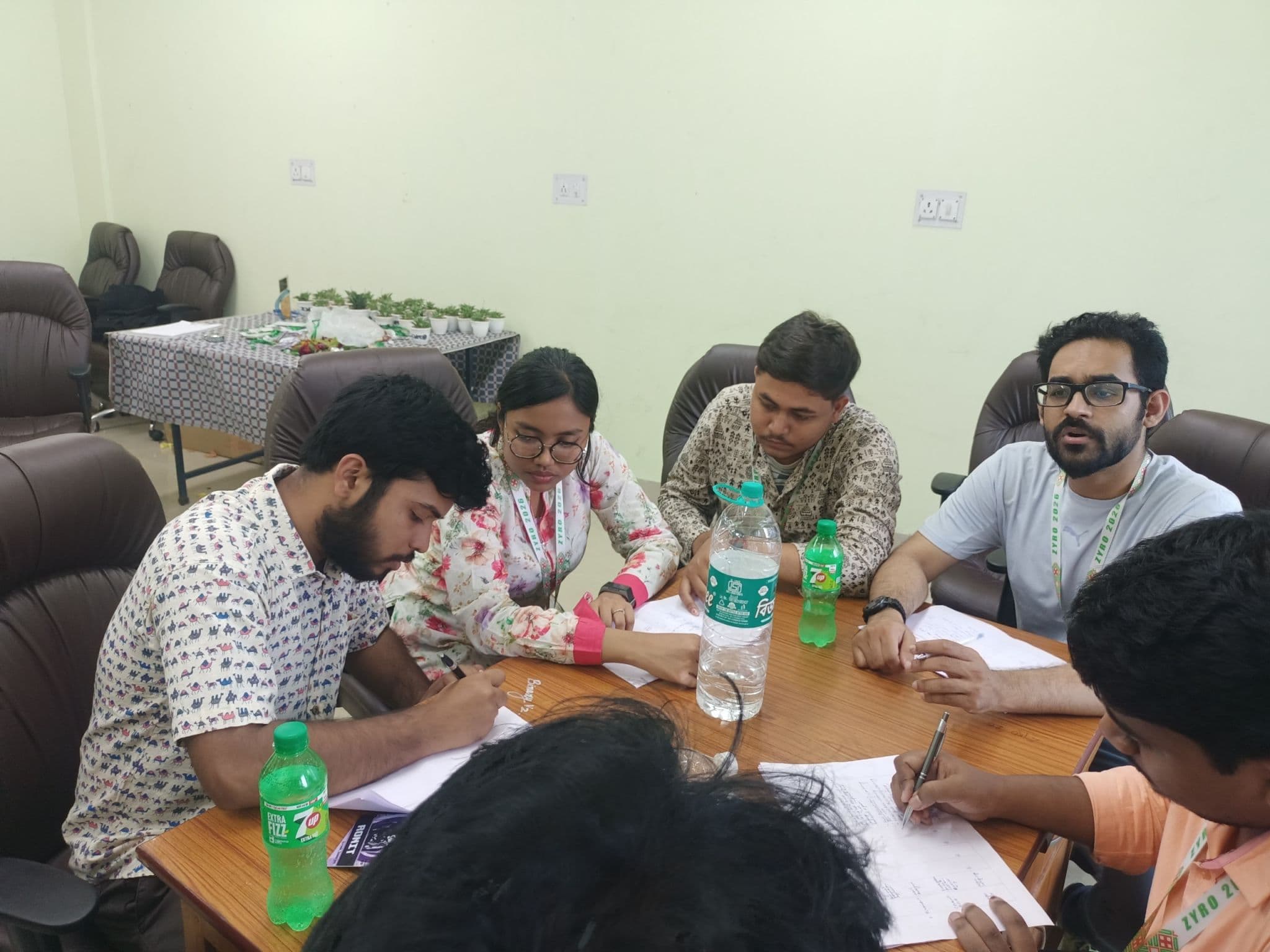 Participants planning together around a table